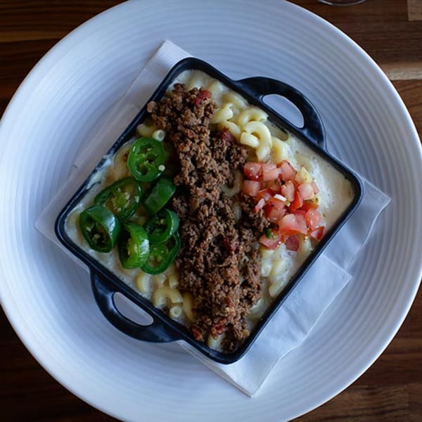 Prados Modern Mexican Cantina's mac and cheese with ground beef, jalapeños, and diced tomatoes.